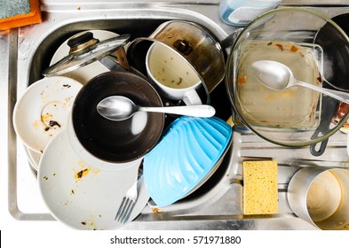 Dirty Messy Dishes In A Sink, View From Above