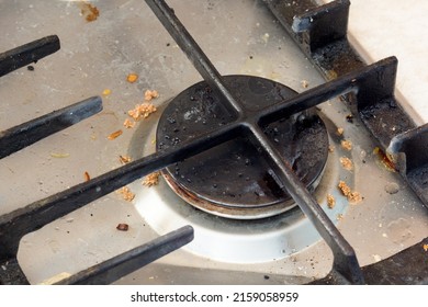 Dirty Metallic Surface Of Gas Stovetop With Burner Cap And Grate