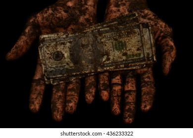 Dirty Money Is Not Clean Hands  On A Black Background