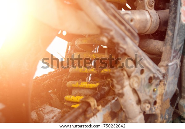 dirty\
motorcycle engine in oil lubrication. cylinder\
Detail on a modern\
and dirty motorcycle engine with oil\
fugues