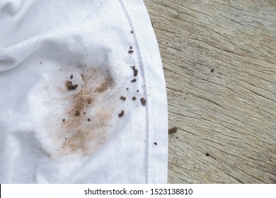 Dirty Mud Soil Stain On White Shirt From Kid Playing In Daily Life. Stain For Cleaning Concept 