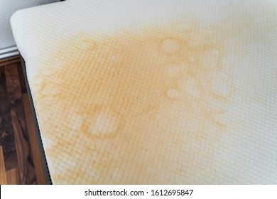 Dirty Old Bed Mattress With Yellow Stains