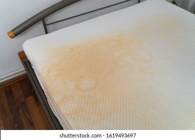 Dirty Old Bed Mattress With Yellow Stains