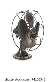 Dirty old vintage metal fan isolated on white