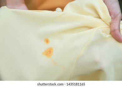 Dirty Orange Sauce Stain On Yellow Shirt From Eating In Daily Life People Daily Life Staining For Cleaning Concept 