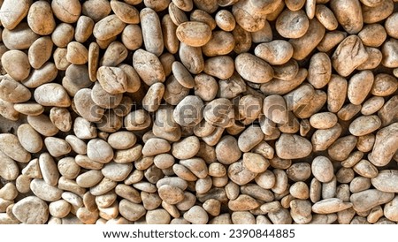 dirty pebbles, close up gravel or tiny small stone, with dirt and brown, for background, decoration, construction 