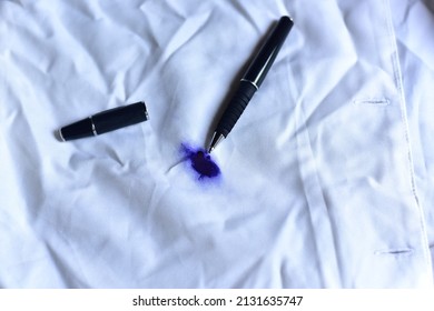 Dirty Pen Ink Stain On Fabric From Accident In Daily Life. Concept Of Cleaning Stains On Clothes Or Cleaning The House. Selected 
 Stains On White Shirts