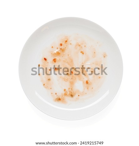 Dirty plate with smeared sauce on white background, top view ストックフォト © 