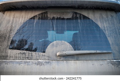 Dirty Rear Car Window With Clear Section