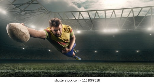 Dirty Rugby Player Catch The Ball In Flight On Professional Rugby Stadium