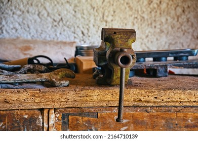 Dirty Set Of Vintage Hand Tools On Wooden Table