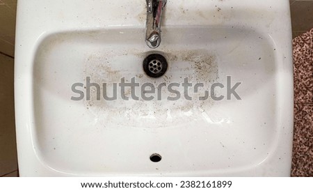 dirty sink, white sink and pipe for wash hand, grunge old dirty metal rusty sink background,An old rusty bathtub surface with a metal drain hole. Dirty cracked unclean bath or sink with red rust stain