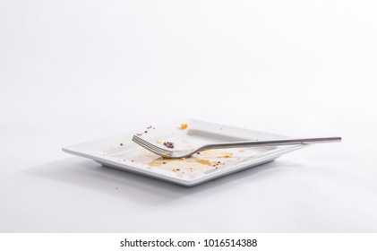 Dirty Square Plate With A Fork