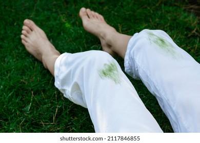 Dirty stain of fresh grass on white clothes. daily life stain concept. outdoors
 - Shutterstock ID 2117846855