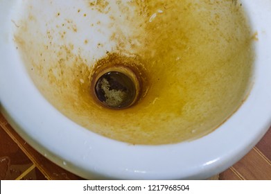 Dirty And Stains On Blurry Toilet Bowl.