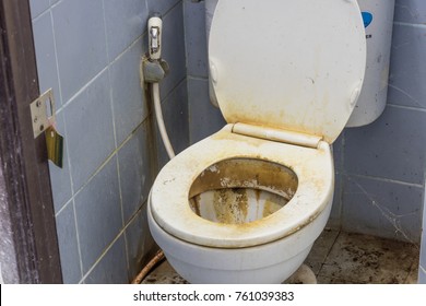 Dirty and stains on toilet bowl
