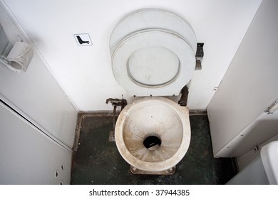 Dirty toilet in a train