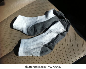 Dirty Used Socks On Car Seat..