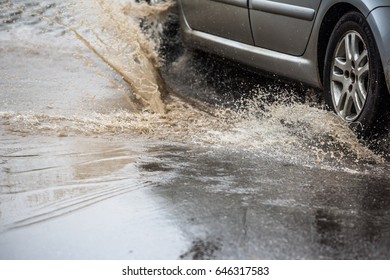 Dirty Water Splash After Vehicle Roaring By