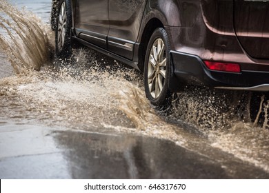 dirty water splash after vehicle roaring by - Shutterstock ID 646317670