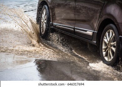 Dirty Water Splash After Vehicle Roaring By