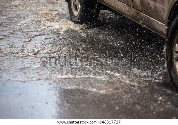 dirty water splash
after vehicle roaring by