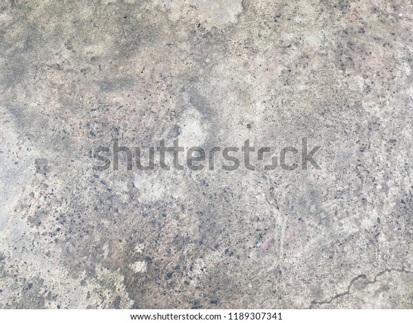 Dirty wet cement\
floor background and\
texture