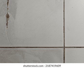 Dirty White Broken Ceramic Floor