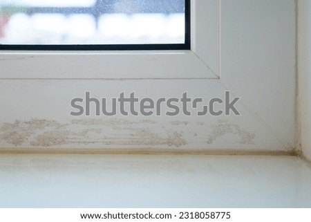 Dirty window frame after sealing cracks with duct tape. Need special cleaners for difficult stains. Cleaning call after renovation work. Damaged frames with glue residue plaque on surface. Dusty glass Stock foto © 