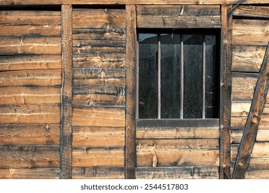 Dirty window in an old wooden farm building. Natural vintage texture. - Powered by Shutterstock