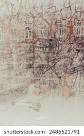Dirty window with reflection of building in front. Dusty window of abandoned building. Street art on glass concept. Urban lifestyle. Drawing on dirty old window. Vintage background. 