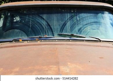 The Dirty Windshield Of An Old Car