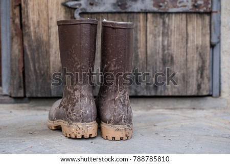 Farmer´s dirty workboots