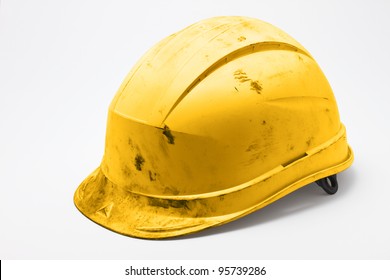 Dirty Yellow Hard Hat On White Background