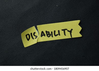 Disability To Be Ability Write On Sticky Notes Isolated On Office Desk.