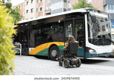 Disability collection. Woman in electric wheelchair in front of an inaccessible bus for people with reduced mobility. - Powered by Shutterstock