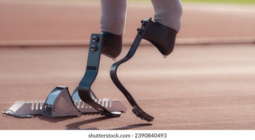 Disabled athletes with running blade used for short races on a running track. - Powered by Shutterstock