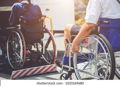 Disabled bus concept : Disabled people sitting on wheelchair and going to the public bus