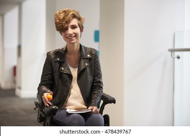 Disabled Female University Student Smiling To Camera