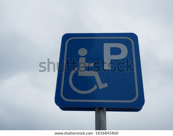 disabled or handicap\
symbol car parking.