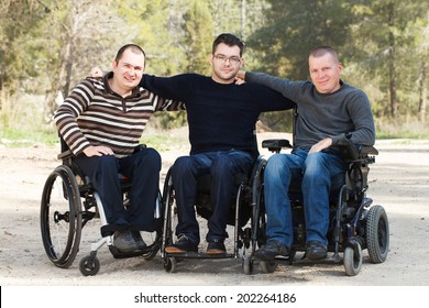 Disabled Happy Friends Having Fun Together Outside.