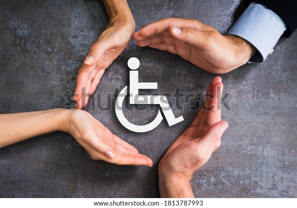 Disabled Icon. Worker Injury And Disability.\
Hands Protecting