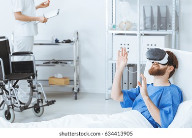 Disabled Invalid Patient During Virtual Reality Therapy 