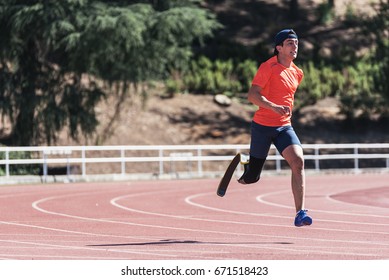 Disabled Man Athlete Training With Leg Prosthesis. Paralympic Sport Concept.