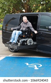 Disabled Man On Wheelchair Car Lift