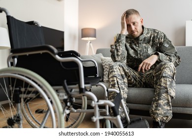 Disabled Military Soldier In Wheelchair With PTSD After Injury And Trauma