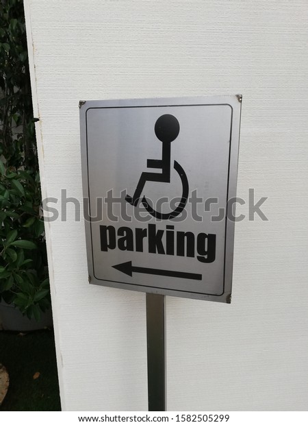 disabled parking sign\
at a five star hotel 