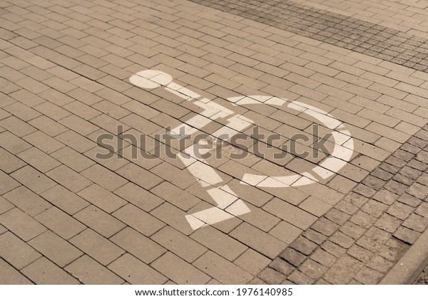 Disabled\
parking sign, disabled parking in public\
area