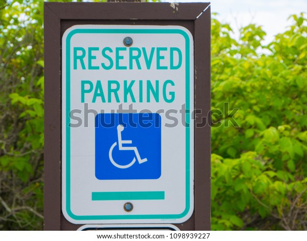 Disabled parking space\
sign sign on a pole