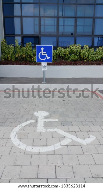 Disabled people car park space with sign board.\
Only for disabled\
people.